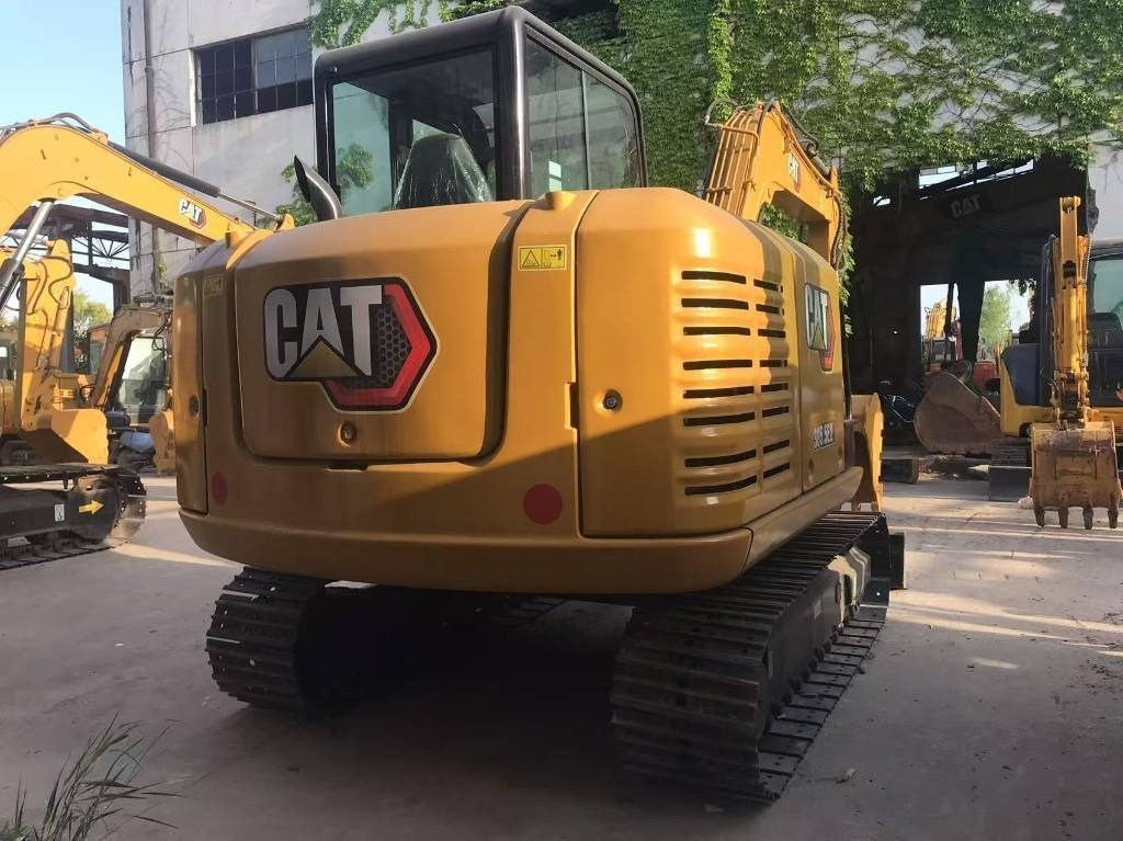 CAT 305.5E2 - Lánctalpas kotró: 4 kép. CAT 305.5E2 - Lánctalpas kotró: 4 kép.