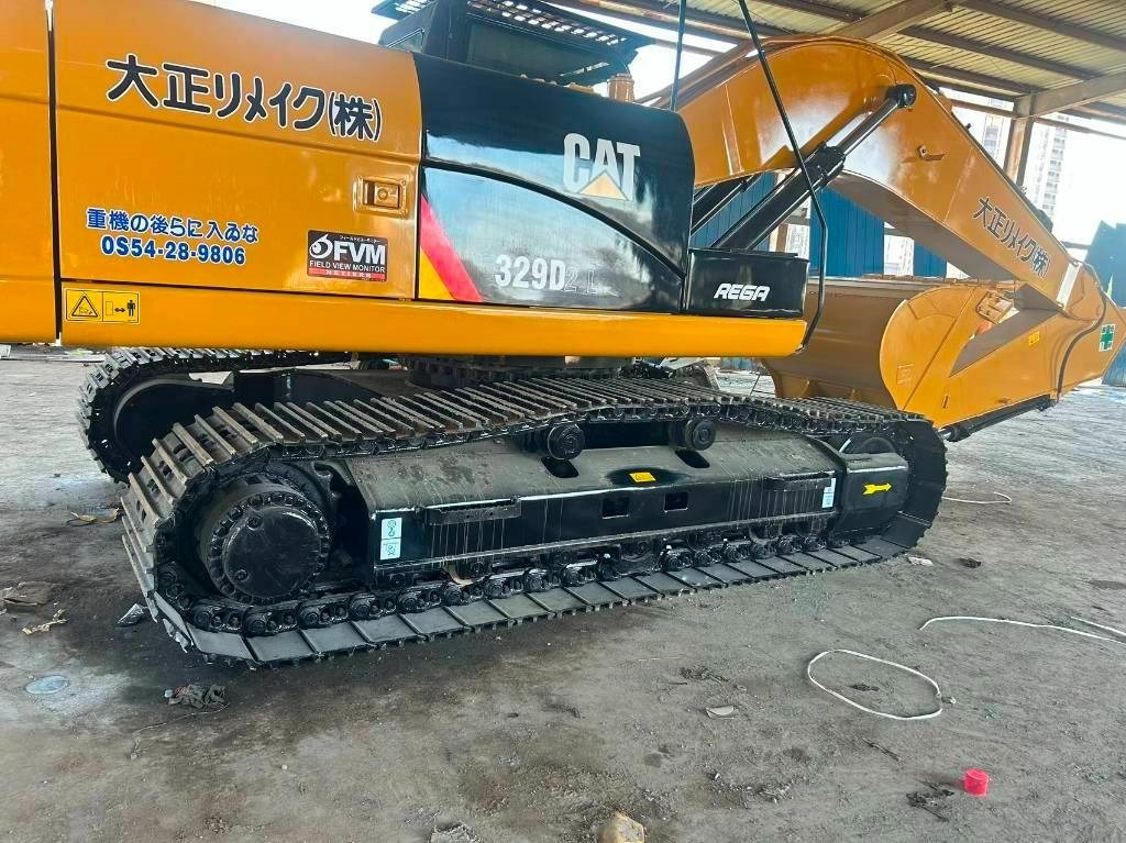 Lánctalpas kotró CAT 329 D: 11 kép.