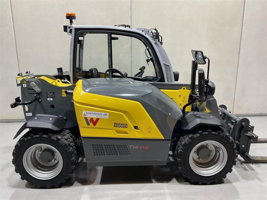 Wacker Neuson TH412 - Teleszkópos emelő: 1 kép. Wacker Neuson TH412 - Teleszkópos emelő: 1 kép.