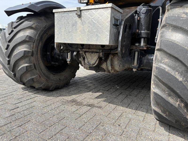 Gumikerekes kotró JCB Hydradig 110W: 6 kép.