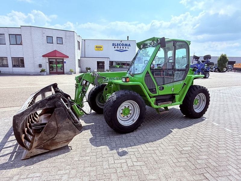 Merlo P34.7 Top Verreiker Pelikaanbak+ pallet - Teleszkópos rakodó: 1 kép. Merlo P34.7 Top Verreiker Pelikaanbak+ pallet - Teleszkópos rakodó: 1 kép.