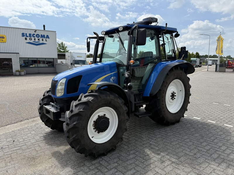New Holland T5040 CAB + GPS - Traktor: 1 kép. New Holland T5040 CAB + GPS - Traktor: 1 kép.