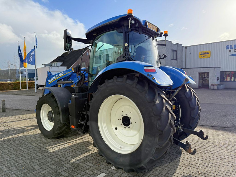 New Holland T7.210 AC Stage V + TL770 Voorlader - Traktor: 2 kép. New Holland T7.210 AC Stage V + TL770 Voorlader - Traktor: 2 kép.