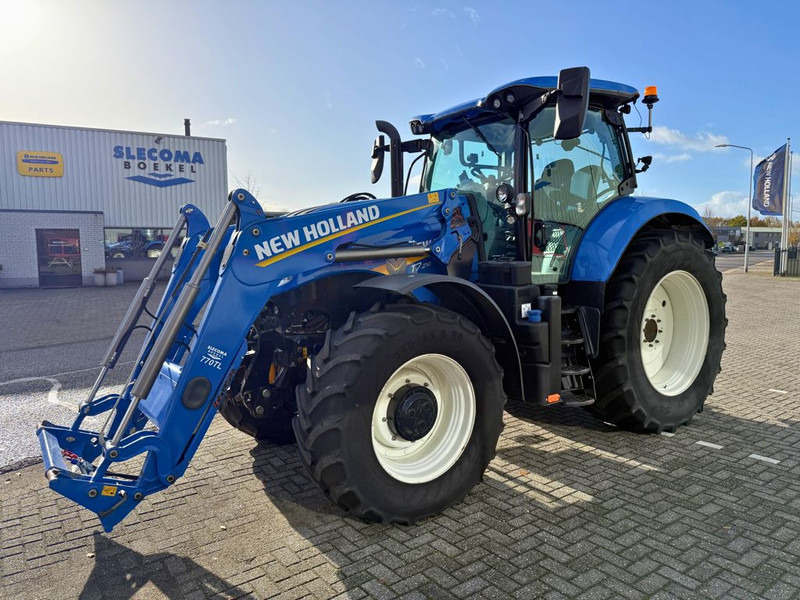 New Holland T7.210 AC Stage V + TL770 Voorlader - Traktor: 1 kép. New Holland T7.210 AC Stage V + TL770 Voorlader - Traktor: 1 kép.