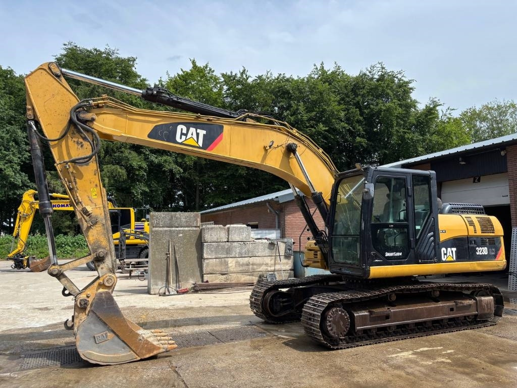 CAT 323 D LN - Lánctalpas kotró: 1 kép. CAT 323 D LN - Lánctalpas kotró: 1 kép.