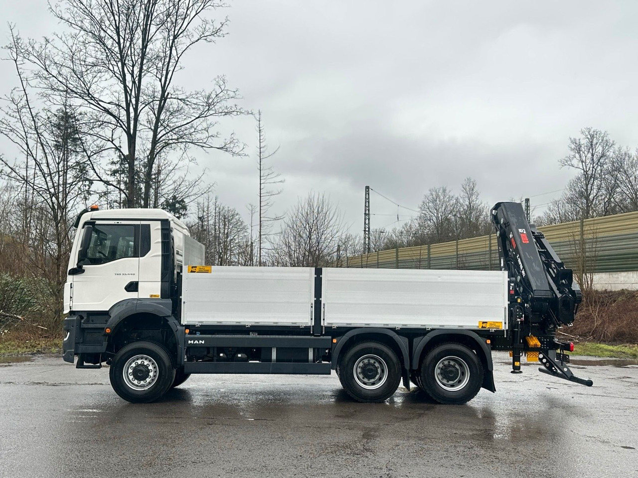 MAN TGS 33.440 6x6 Kran HIAB X-HiPro 302 E 6 - Platós teherautó, Darus autó: 4 kép. MAN TGS 33.440 6x6 Kran HIAB X-HiPro 302 E 6 - Platós teherautó, Darus autó: 4 kép.