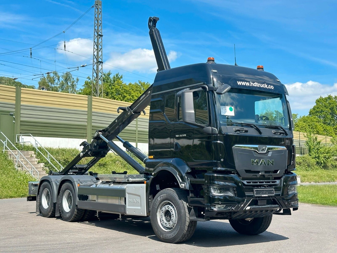 MAN TGS 33.520 6X4 Euro6e Abrollkipper MULTILIFT - Horgos rakodó teherautó, Darus autó: 1 kép. MAN TGS 33.520 6X4 Euro6e Abrollkipper MULTILIFT - Horgos rakodó teherautó, Darus autó: 1 kép.