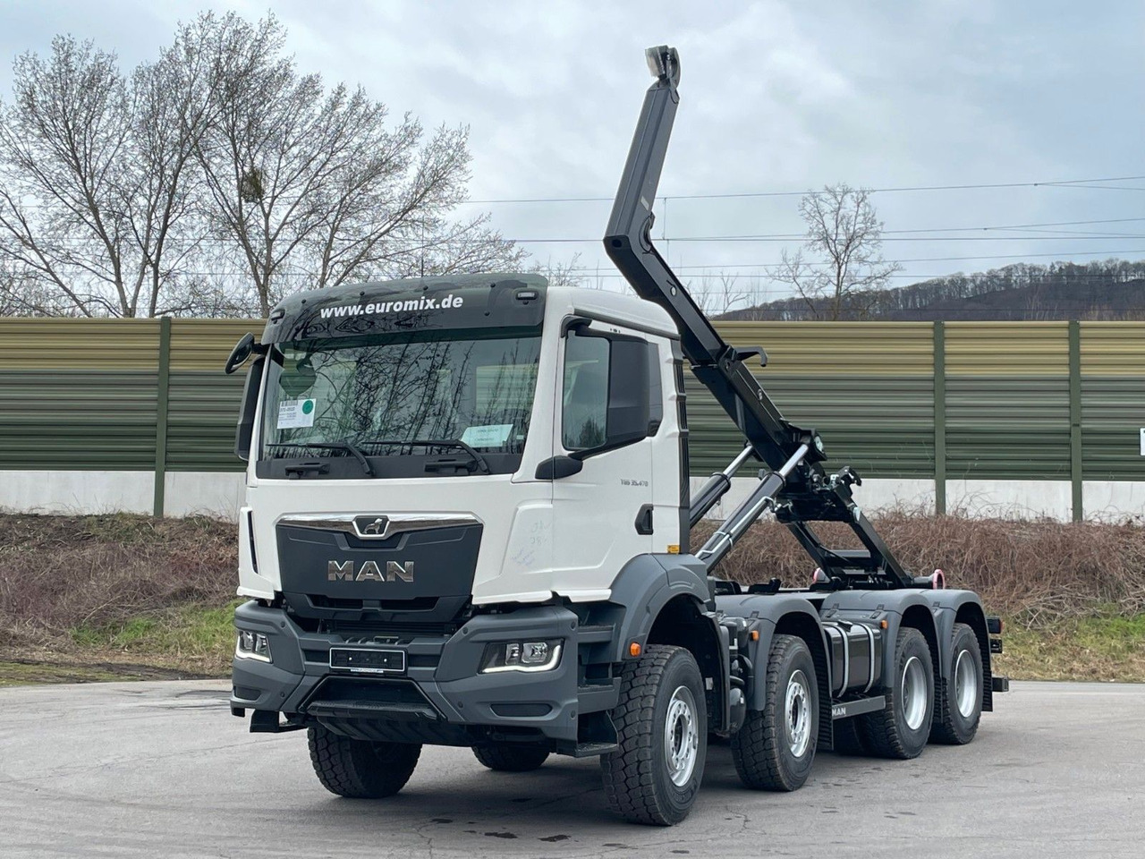 MAN TGS 35.470 8x4 Euro6e Hiab MultLift Abrollkipper - Horgos rakodó teherautó, Darus autó: 1 kép. MAN TGS 35.470 8x4 Euro6e Hiab MultLift Abrollkipper - Horgos rakodó teherautó, Darus autó: 1 kép.