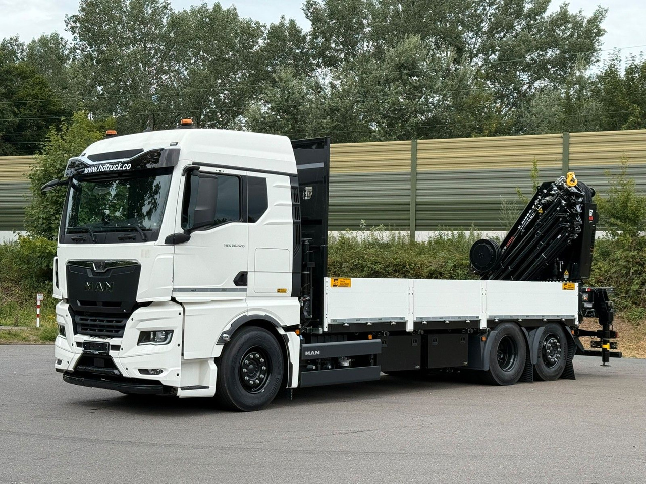 MAN TGX 26.520 TG3 Retarder / 6X2 Hiab 548 E 8 - Darus autó: 2 kép. MAN TGX 26.520 TG3 Retarder / 6X2 Hiab 548 E 8 - Darus autó: 2 kép.