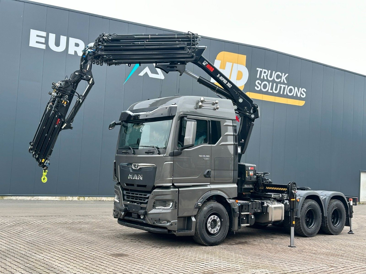 MAN TGX 26.580 6x4 Kran Hiab 302-6 + Jib-4 - Darus autó: 1 kép. MAN TGX 26.580 6x4 Kran Hiab 302-6 + Jib-4 - Darus autó: 1 kép.
