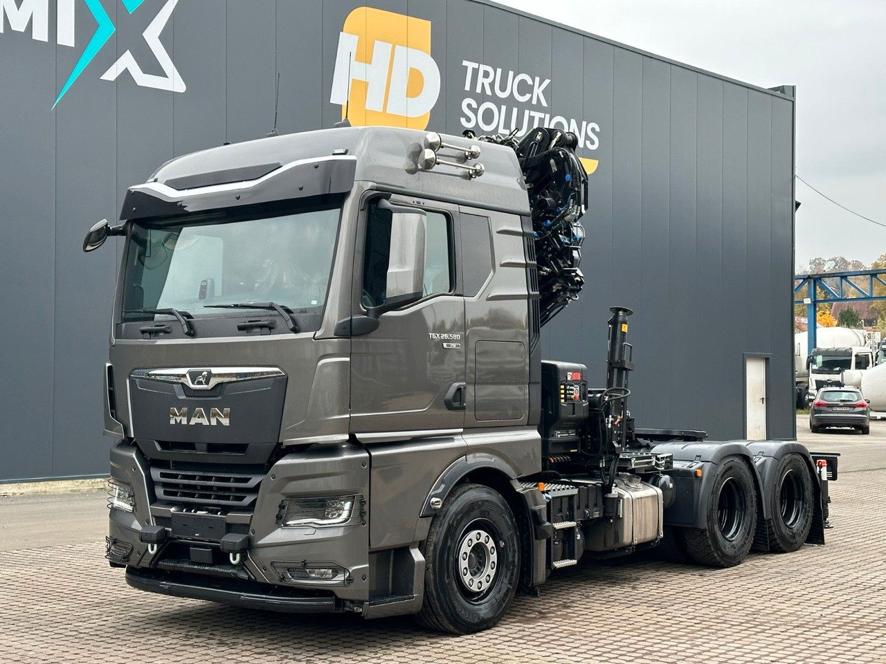 MAN TGX 26.580 6x4 Kran Hiab 302-6 + Jib-4 - Nyergesvontató: 2 kép. MAN TGX 26.580 6x4 Kran Hiab 302-6 + Jib-4 - Nyergesvontató: 2 kép.