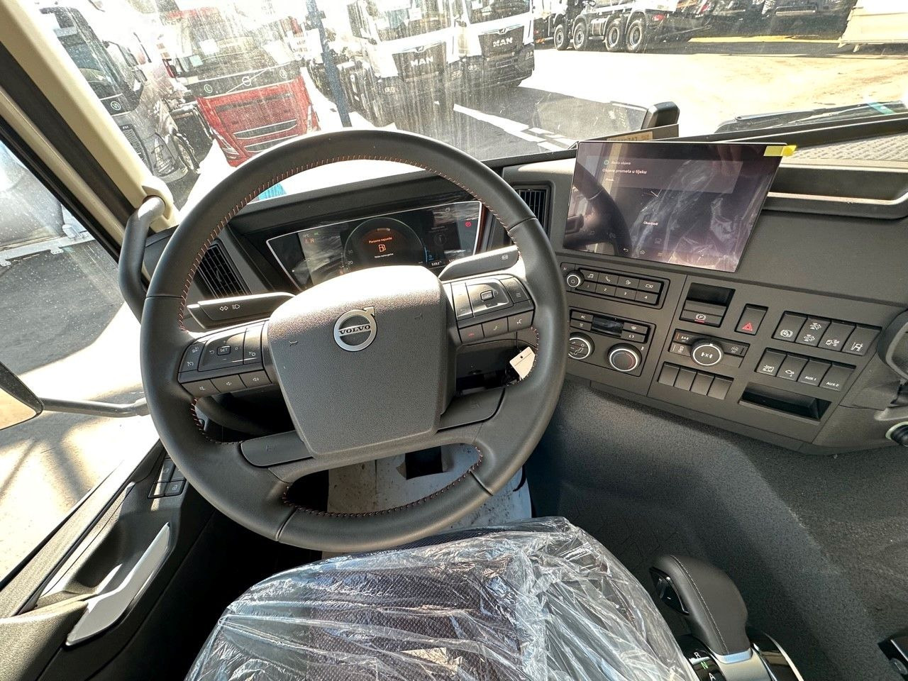 Alvaz teherautó Volvo FMX 500 8x4: 14 kép.