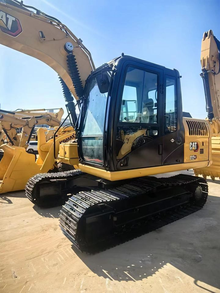 Caterpillar Used 20 Ton Tier 4 Excavator 312GC 312D2GC 313D 320D with Low Price Core Components Engine and Bearing - Lánctalpas kotró: 2 kép. Caterpillar Used 20 Ton Tier 4 Excavator 312GC 312D2GC 313D 320D with Low Price Core Components Engine and Bearing - Lánctalpas kotró: 2 kép.