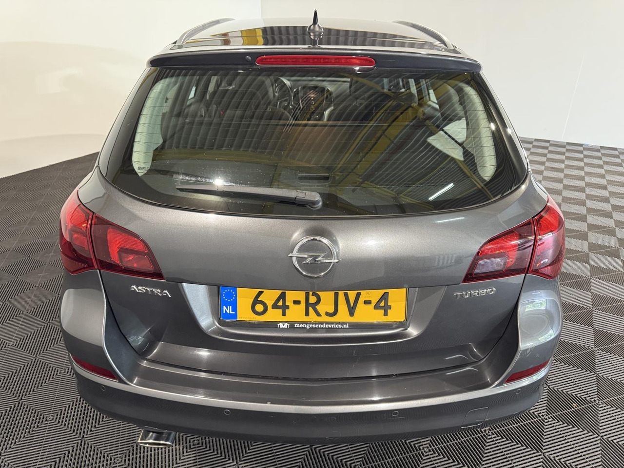 Opel Astra Sports Tourer 1.4 Turbo Cosmo 64-RJV-4 - Autó: 2 kép. Opel Astra Sports Tourer 1.4 Turbo Cosmo 64-RJV-4 - Autó: 2 kép.