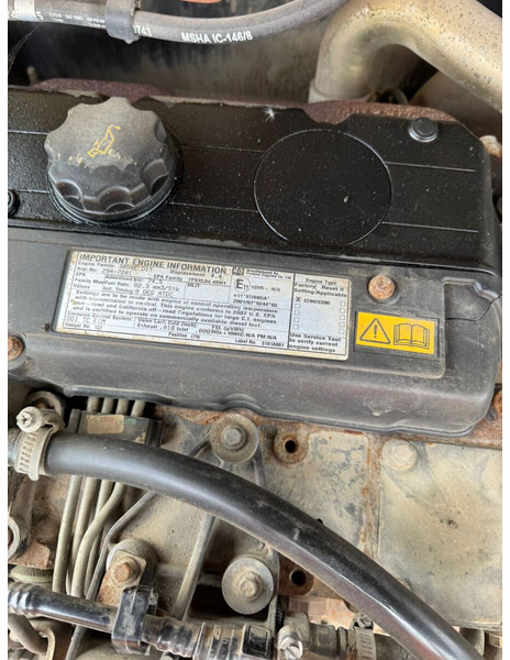 Teleszkópos rakodó Caterpillar TH360: 9 kép.