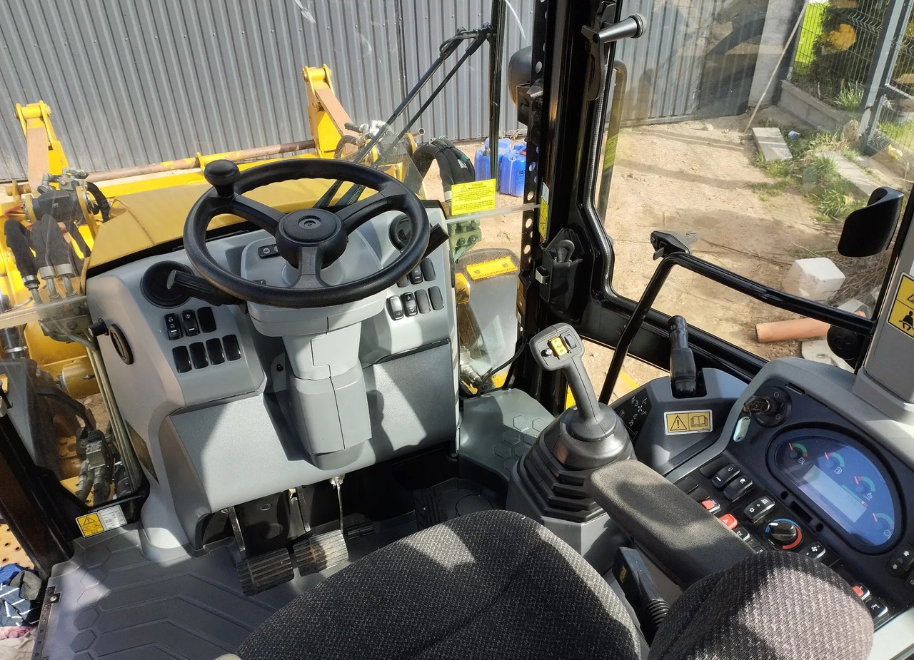 CATERPILLAR 432F II - Kotrórakodó: 5 kép. CATERPILLAR 432F II - Kotrórakodó: 5 kép.