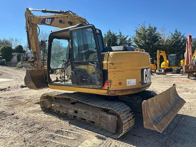 Caterpillar 311C - Kotrógép: 4 kép. Caterpillar 311C - Kotrógép: 4 kép.