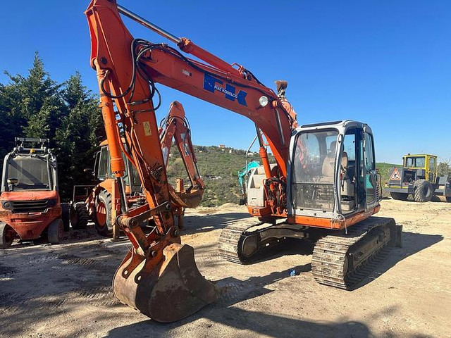 Fiat KOBELCO E115SR - Kotrógép: 1 kép. Fiat KOBELCO E115SR - Kotrógép: 1 kép.