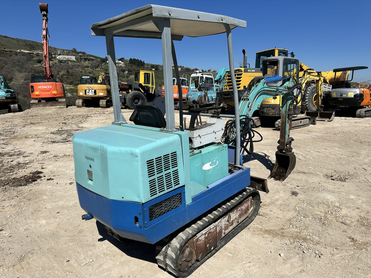 UTEX 1.3 - Minikotró: 2 kép. UTEX 1.3 - Minikotró: 2 kép.