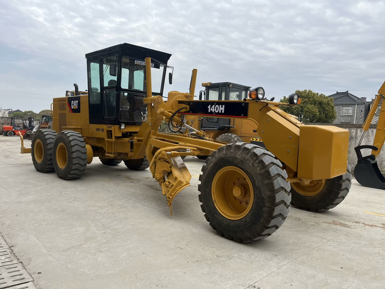 CATERPILLAR 140H - Gréder: 4 kép. CATERPILLAR 140H - Gréder: 4 kép.