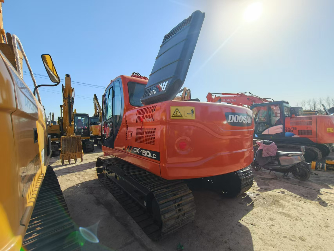 DOOSAN DX150 - Kotrógép: 5 kép. DOOSAN DX150 - Kotrógép: 5 kép.