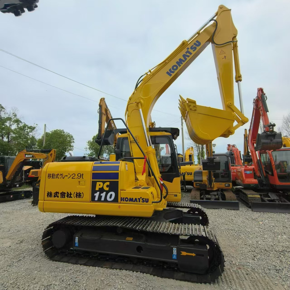 KOMATSU PC110 - Lánctalpas kotró: 1 kép. KOMATSU PC110 - Lánctalpas kotró: 1 kép.