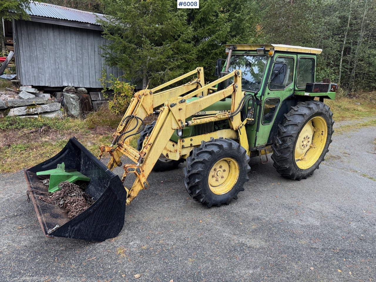 1977 John Deere 2030 w/ front loader, bucket and chains. - Traktor: 2 kép. 1977 John Deere 2030 w/ front loader, bucket and chains. - Traktor: 2 kép.