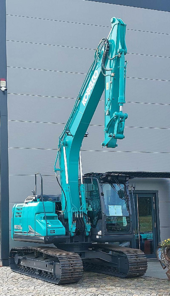 Kobelco SK130LC-11 - Lánctalpas kotró: 2 kép. Kobelco SK130LC-11 - Lánctalpas kotró: 2 kép.