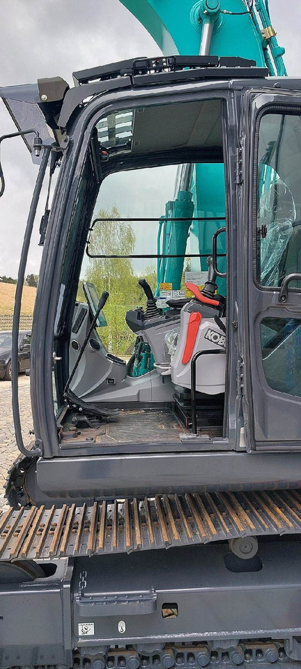 Kobelco SK130LC-11 - Lánctalpas kotró: 3 kép. Kobelco SK130LC-11 - Lánctalpas kotró: 3 kép.