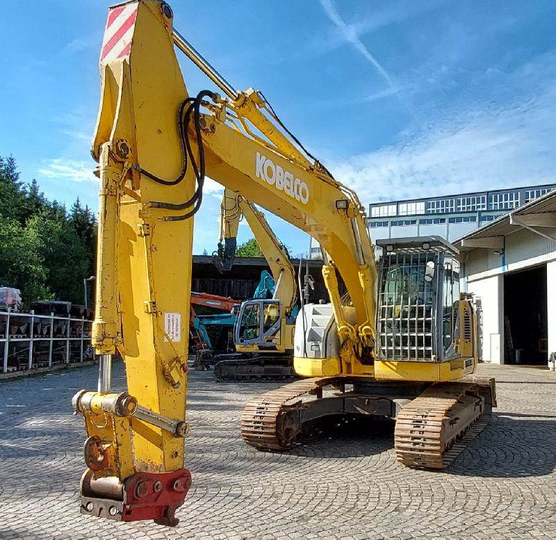 New Holland E235B SRNLC - Lánctalpas kotró: 1 kép. New Holland E235B SRNLC - Lánctalpas kotró: 1 kép.