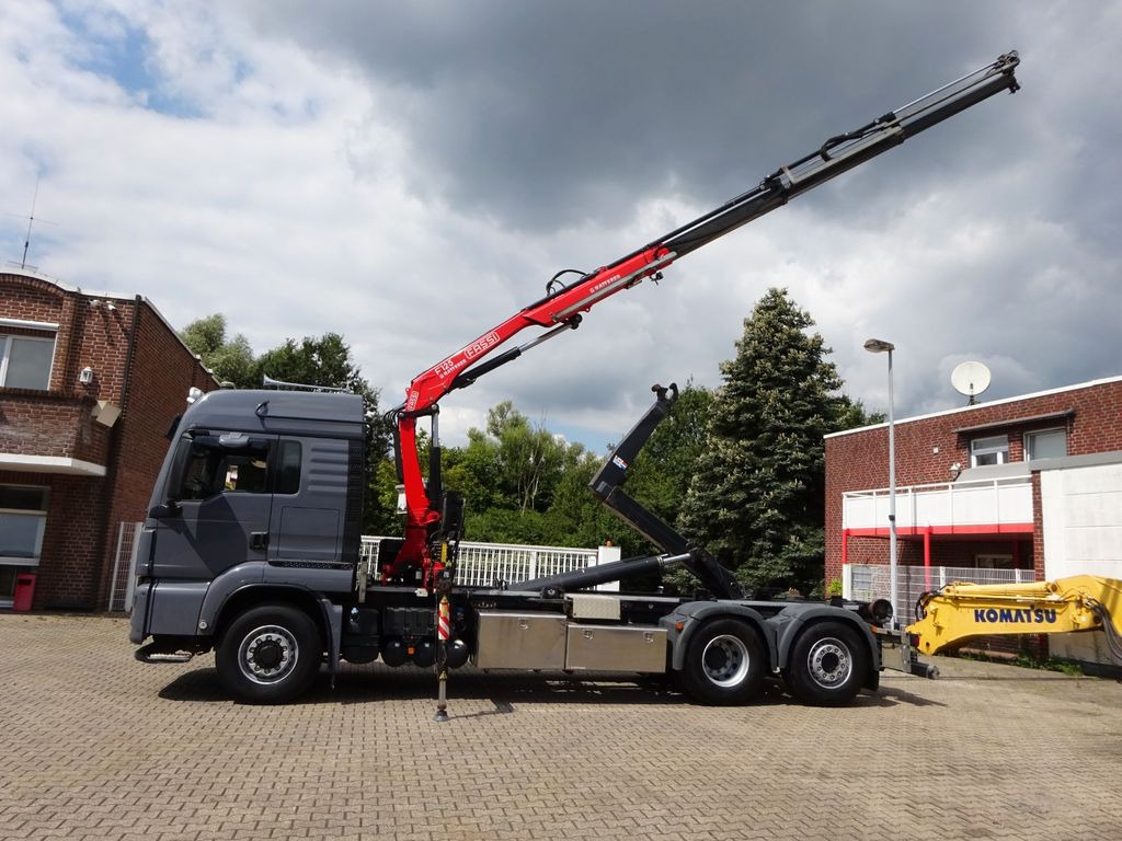 MAN 26.500 Abroller + Fassi F125A Kran 6x2-4 Allrad - Darus autó, Horgos rakodó teherautó: 1 kép. MAN 26.500 Abroller + Fassi F125A Kran 6x2-4 Allrad - Darus autó, Horgos rakodó teherautó: 1 kép.