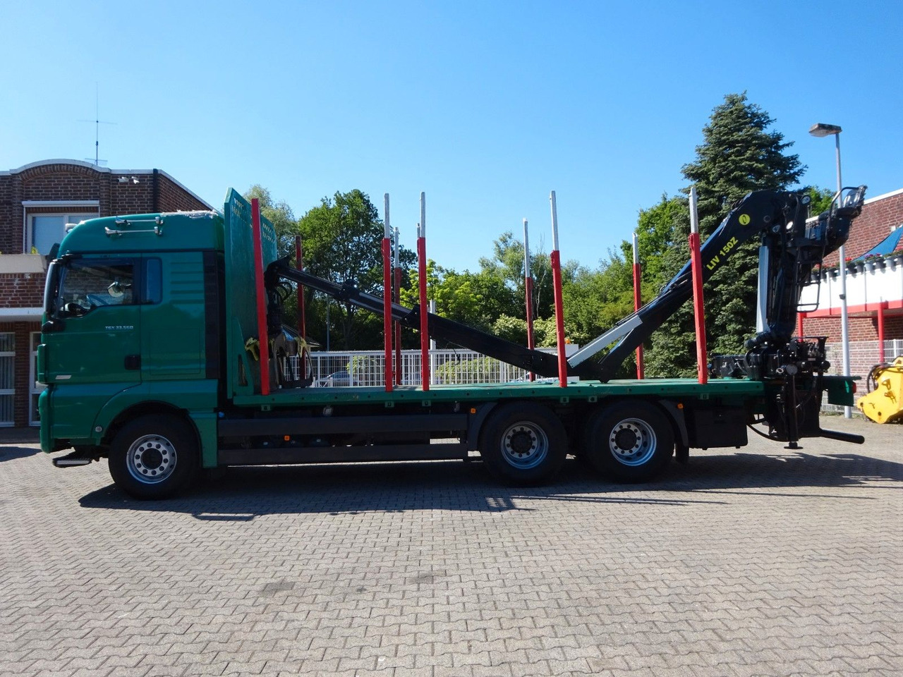 MAN 33.560 TGX mit TAJFUN L150Z Holzladekran 6x4 - Rönkszállító teherautó, Darus autó: 3 kép. MAN 33.560 TGX mit TAJFUN L150Z Holzladekran 6x4 - Rönkszállító teherautó, Darus autó: 3 kép.