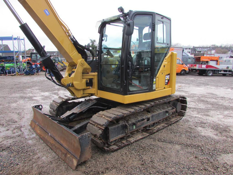 Cat 308 CR Minibagger 59.000 EUR - Minikotró: 2 kép. Cat 308 CR Minibagger 59.000 EUR - Minikotró: 2 kép.
