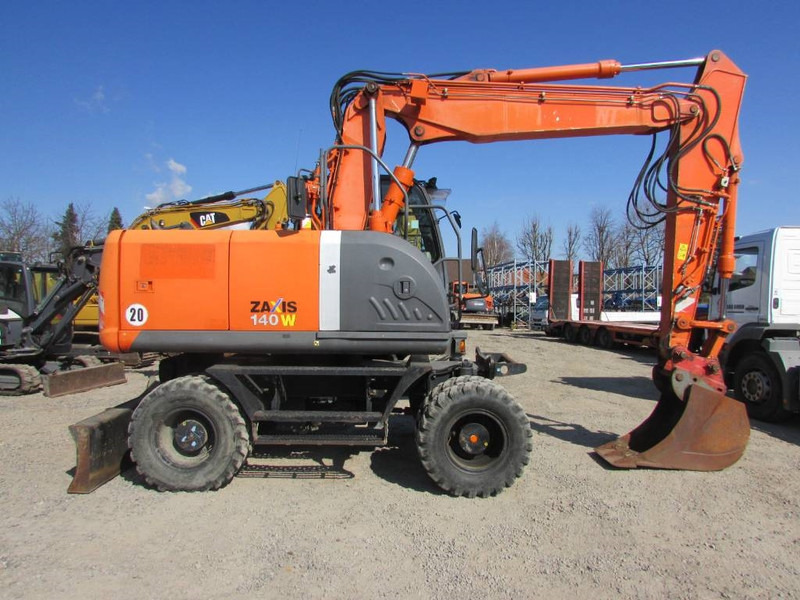 Gumikerekes kotró Hitachi ZX 140 W-3 Mobilbagger 43.000 EUR / Klima: 7 kép.