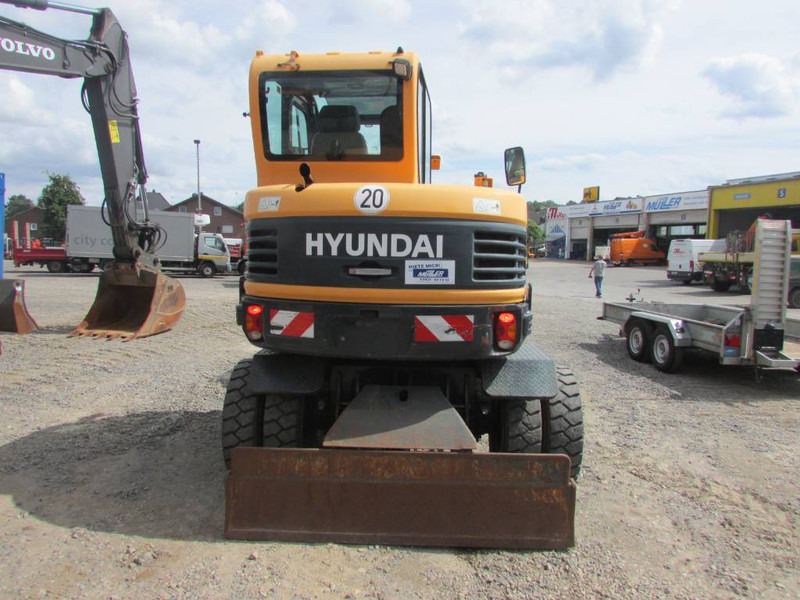 Hyundai Robex 55 W-9 Mobilbagger 34.000 EUR - Gumikerekes kotró: 5 kép. Hyundai Robex 55 W-9 Mobilbagger 34.000 EUR - Gumikerekes kotró: 5 kép.