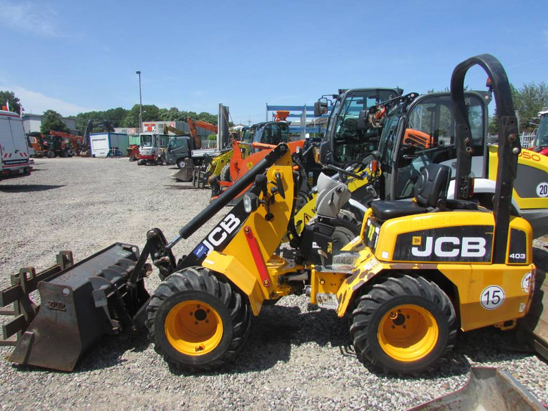 JCB 403 Radlader 22.500 EUR - Gumikerekes homlokrakodó: 1 kép. JCB 403 Radlader 22.500 EUR - Gumikerekes homlokrakodó: 1 kép.