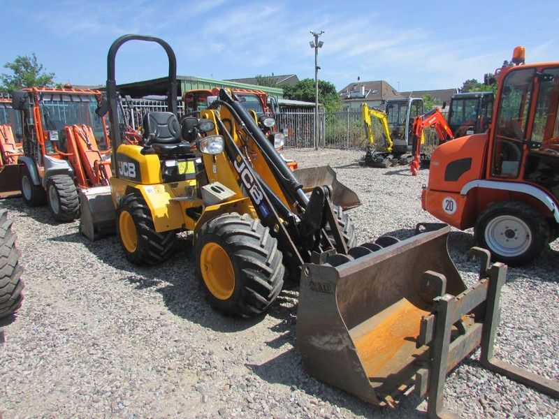 JCB 403 Radlader 22.500 EUR - Gumikerekes homlokrakodó: 5 kép. JCB 403 Radlader 22.500 EUR - Gumikerekes homlokrakodó: 5 kép.