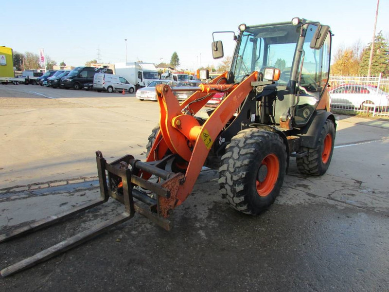 Komatsu WA 70-7 Radlader 24.500 EUR - Gumikerekes homlokrakodó: 2 kép. Komatsu WA 70-7 Radlader 24.500 EUR - Gumikerekes homlokrakodó: 2 kép.