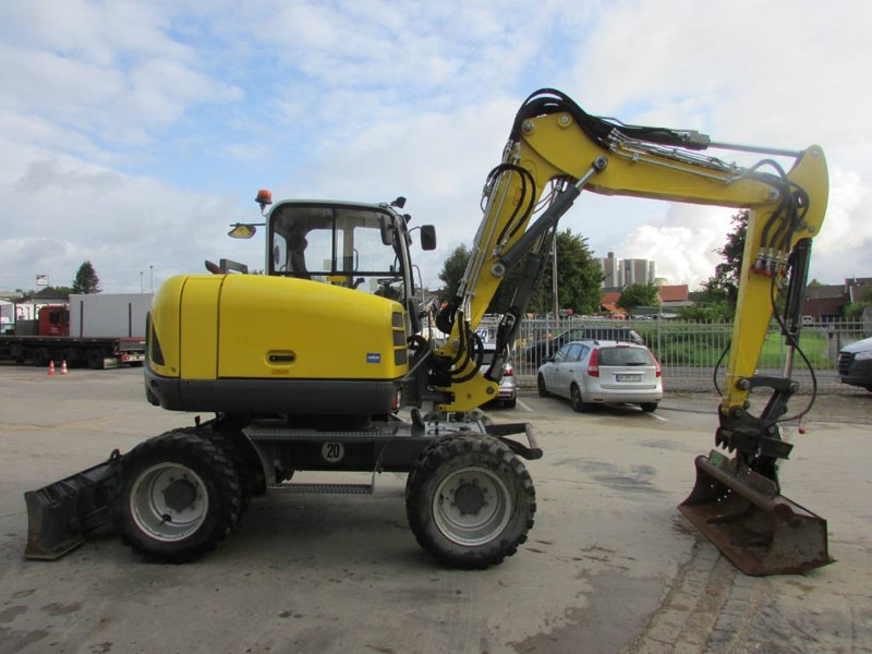 WACKER NEUSON EW 100 Mobilbagger Klima / AC / 59.500 EUR - Gumikerekes kotró: 5 kép. WACKER NEUSON EW 100 Mobilbagger Klima / AC / 59.500 EUR - Gumikerekes kotró: 5 kép.