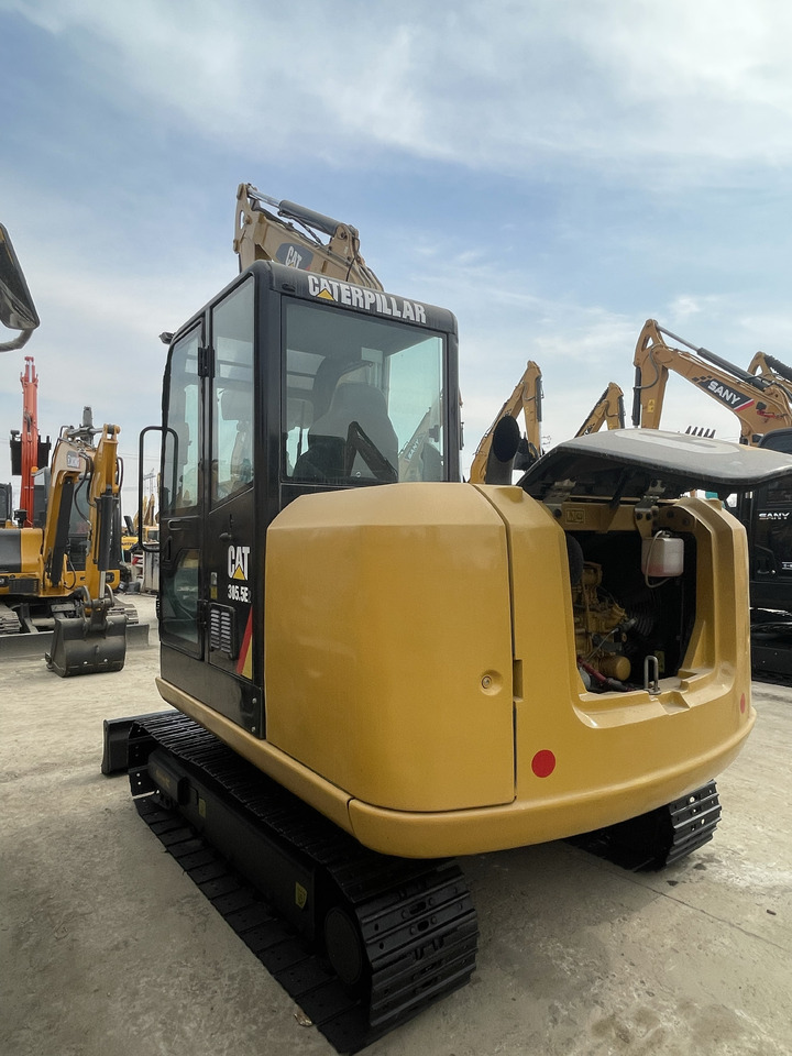 CATERPILLAR 305.5E2 - Minikotró: 2 kép. CATERPILLAR 305.5E2 - Minikotró: 2 kép.