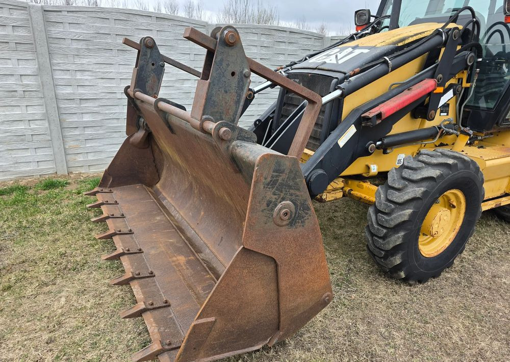 Caterpillar - Kotrórakodó: 4 kép. Caterpillar - Kotrórakodó: 4 kép.