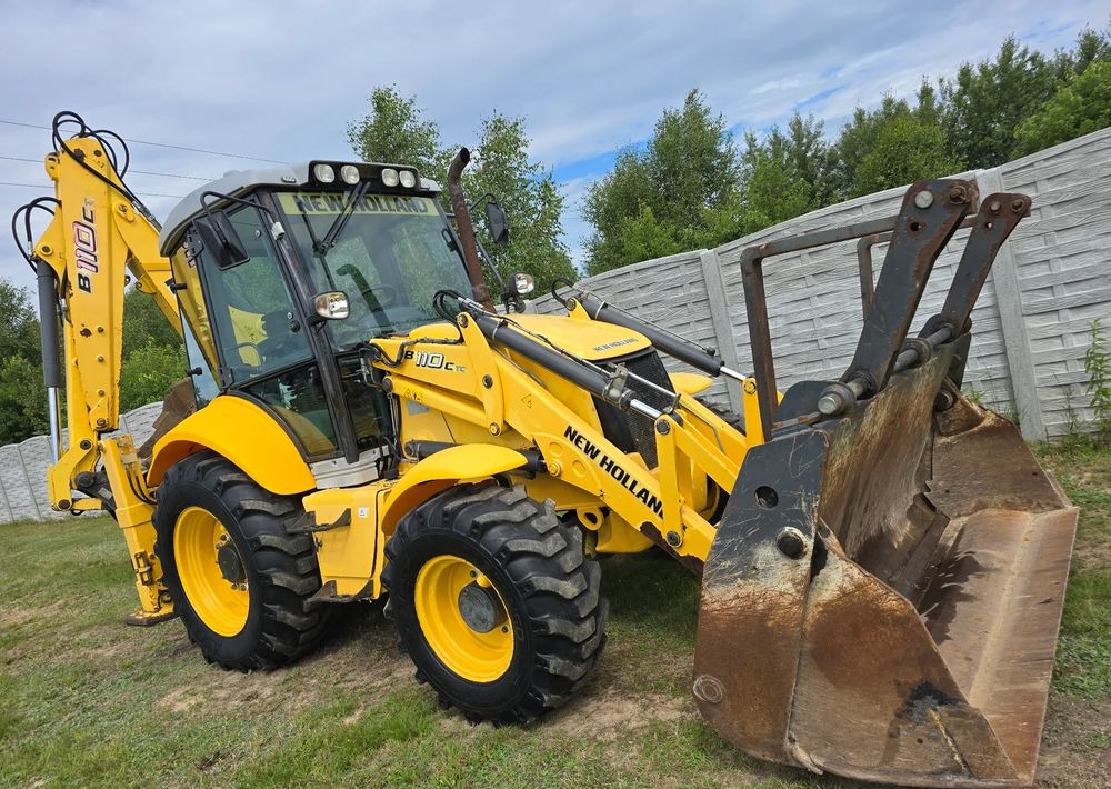 New Holland - Kotrórakodó: 2 kép. New Holland - Kotrórakodó: 2 kép.