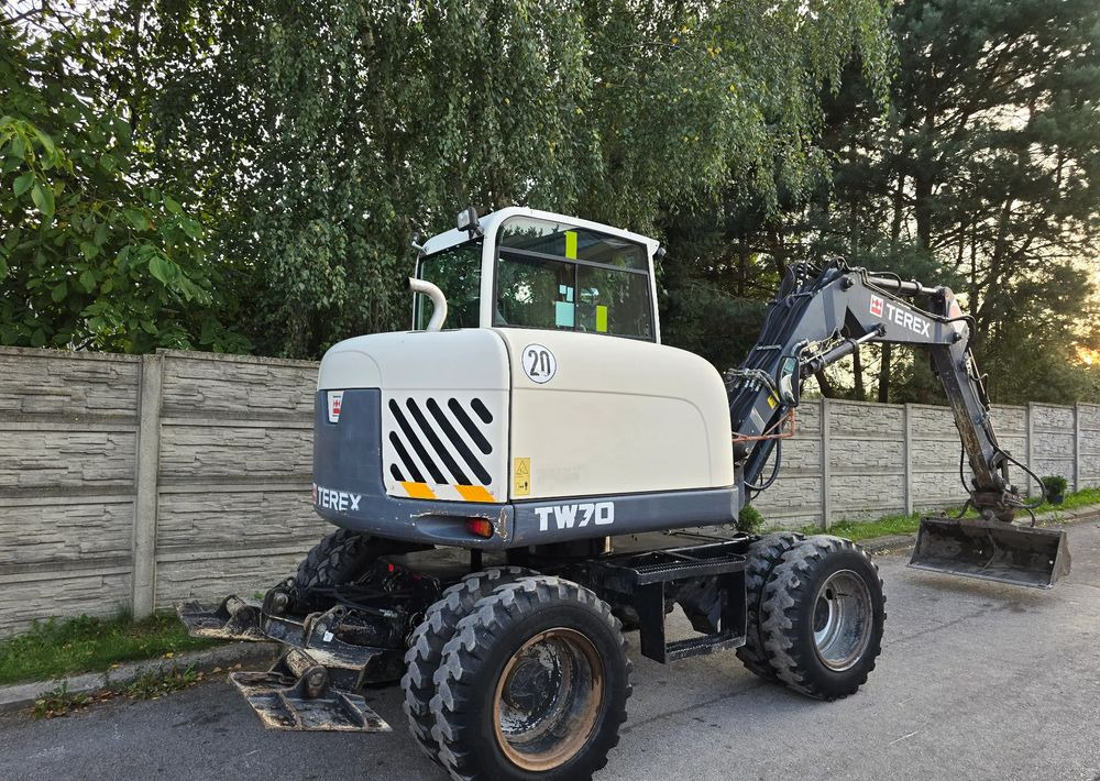 Terex - Gumikerekes kotró: 5 kép. Terex - Gumikerekes kotró: 5 kép.
