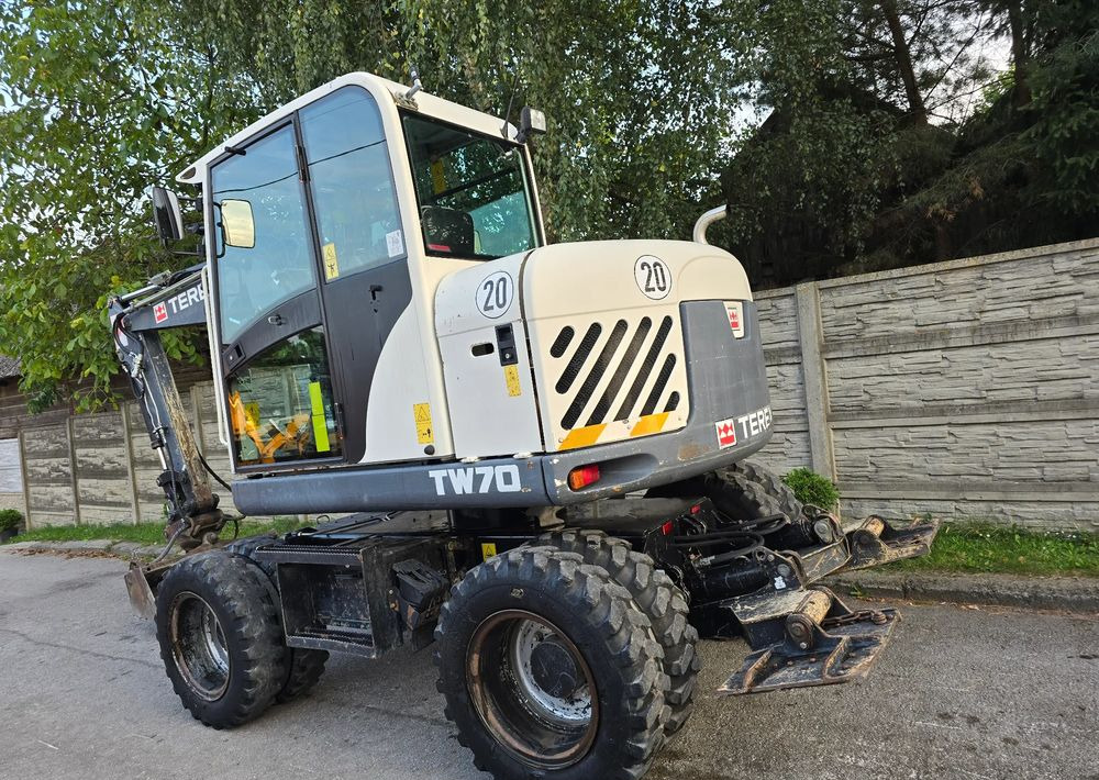 Terex - Gumikerekes kotró: 4 kép. Terex - Gumikerekes kotró: 4 kép.