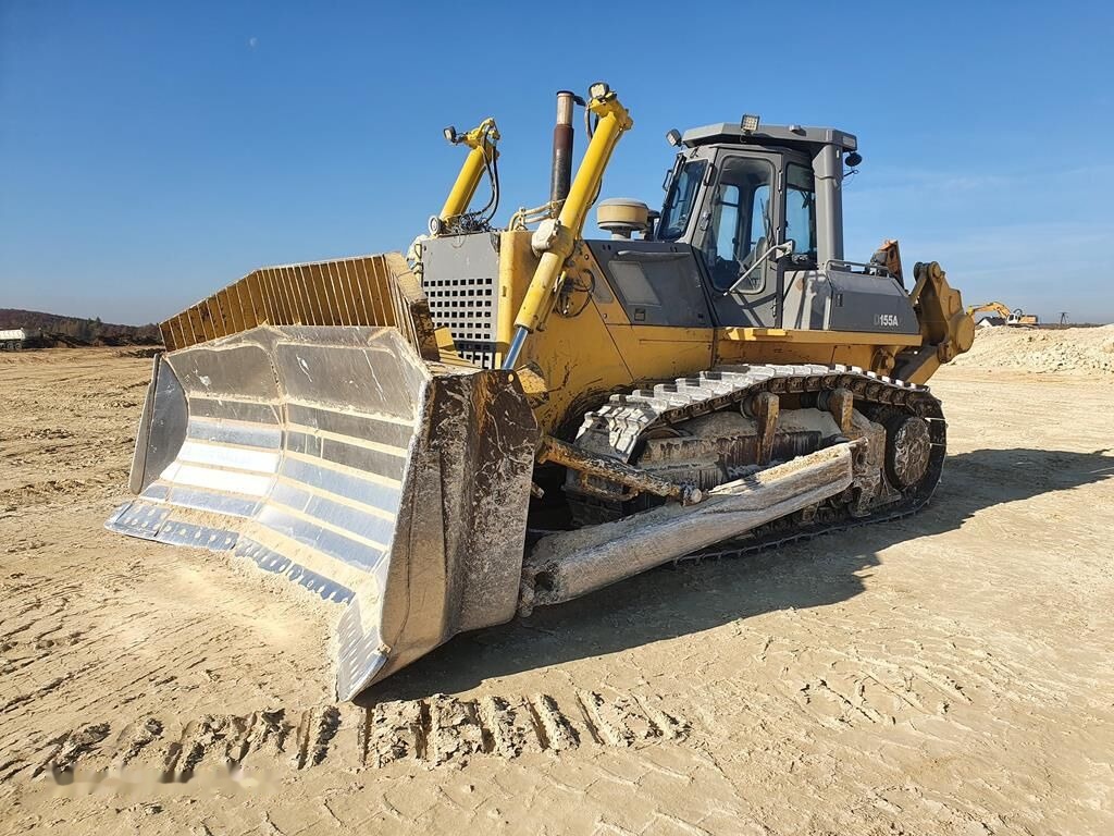 Komatsu D155 - Buldózer: 2 kép. Komatsu D155 - Buldózer: 2 kép.