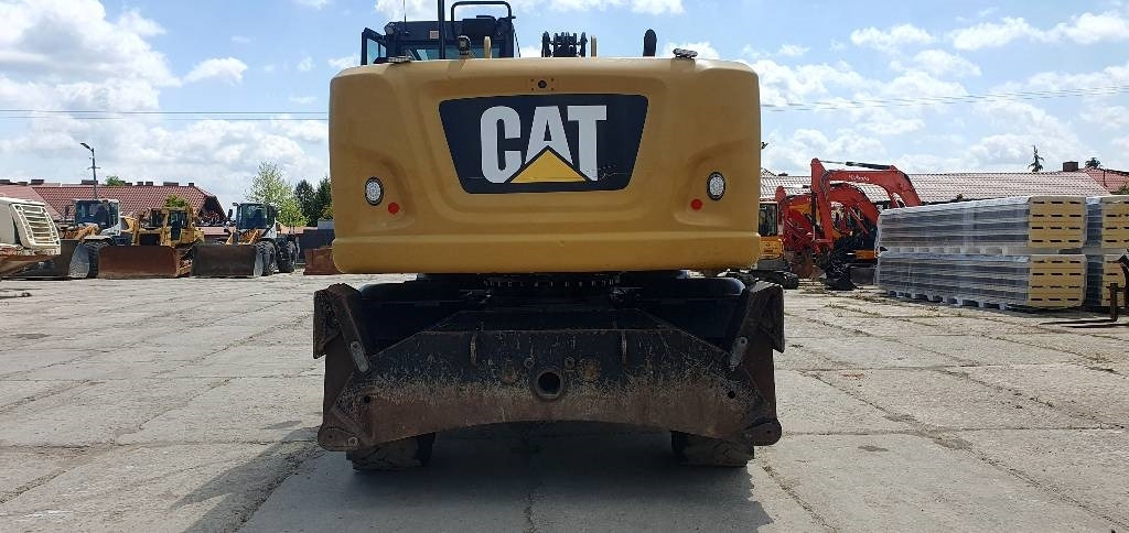 CAT M316F - Gumikerekes kotró: 4 kép. CAT M316F - Gumikerekes kotró: 4 kép.