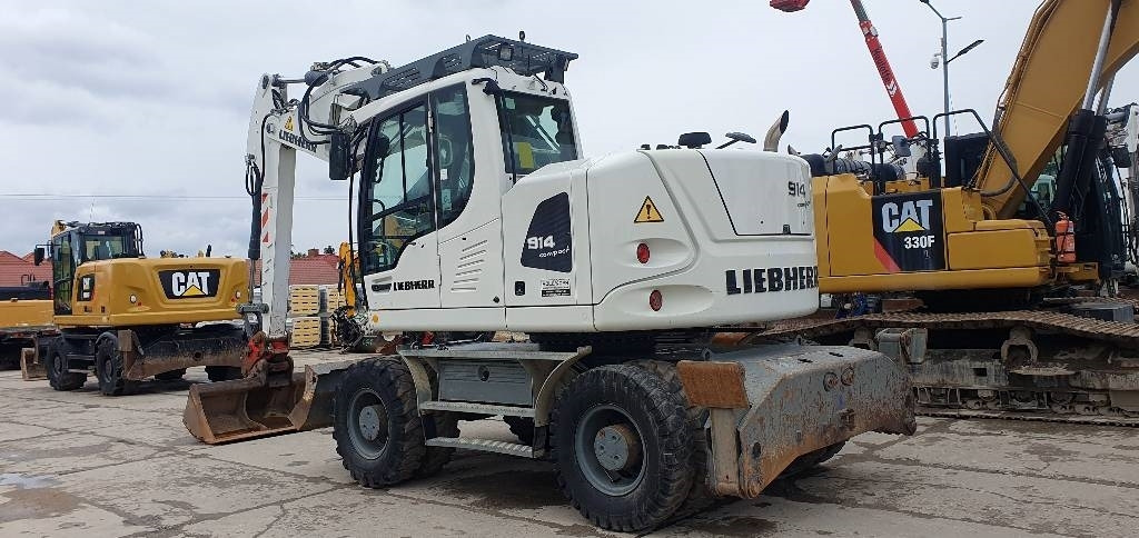 Liebherr A 914 Compact - Gumikerekes kotró: 3 kép. Liebherr A 914 Compact - Gumikerekes kotró: 3 kép.
