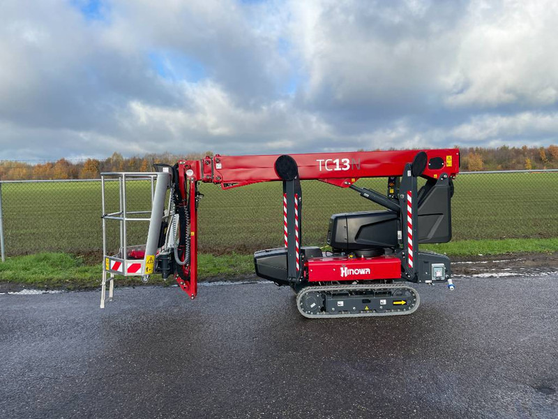 Hinowa TC13N - Teleszkópos emelő, Gumilánctalpas személyemelő: 2 kép. Hinowa TC13N - Teleszkópos emelő, Gumilánctalpas személyemelő: 2 kép.