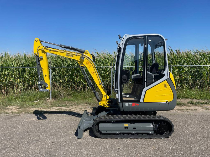 WACKER NEUSON ET24 - Minikotró: 1 kép. WACKER NEUSON ET24 - Minikotró: 1 kép.