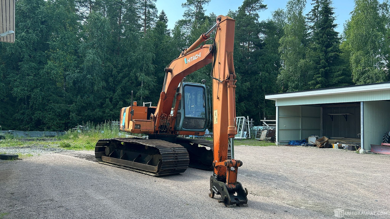 Tela-alustainen kaivinkone Hitatchi EX100M-3, vm. 1994, Lieto - Építőipari gépek: 3 kép. Tela-alustainen kaivinkone Hitatchi EX100M-3, vm. 1994, Lieto - Építőipari gépek: 3 kép.